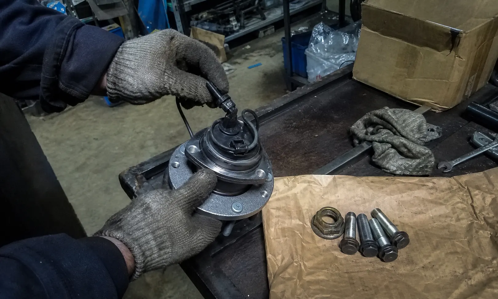 Warehouse receiving inspection of a wheel hub sensor connector and supplied hardware